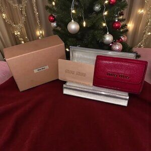 MIU MIU FUSHIA TRIFOLD COMPACT WALLET